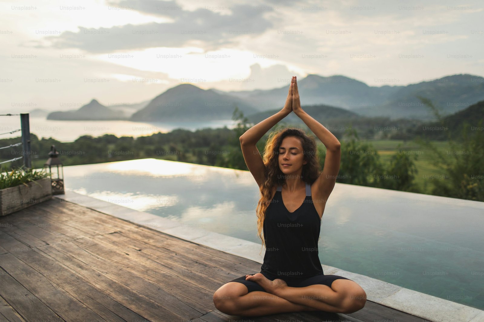 A peaceful morning yoga moment by the mountains